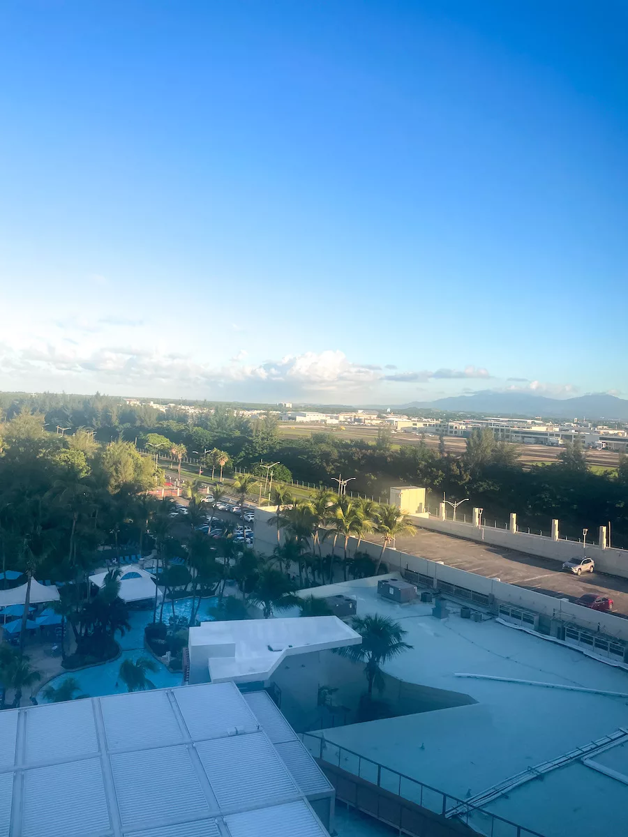 Pool and Airport View from Courtyard Isla Verde Beach Resort 