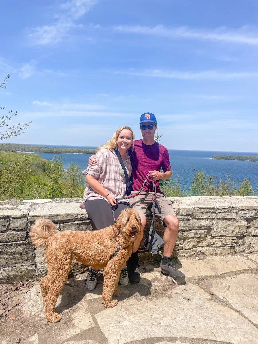 Family with dog posing for photo at Peninsula State Park in Door County