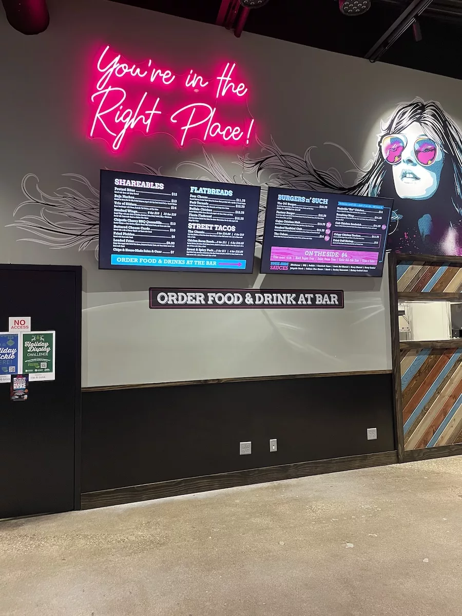 Image of Menu Board and Pink Neon Light at Daiquiri Factory in Davenport, Iowa 