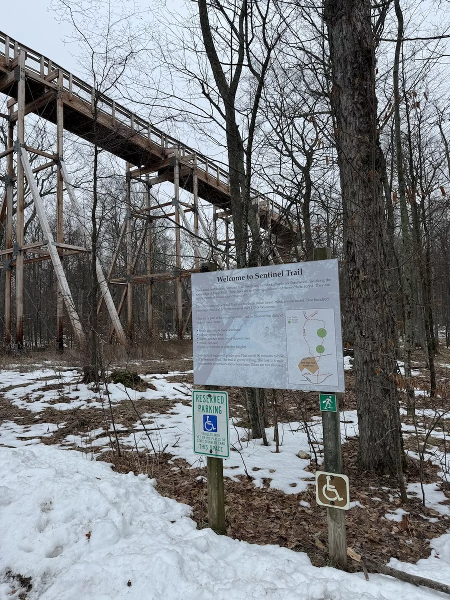 Image of Eagle Tower and sign to entrance to Sentinel Trail in Peninsula State Park, Door County