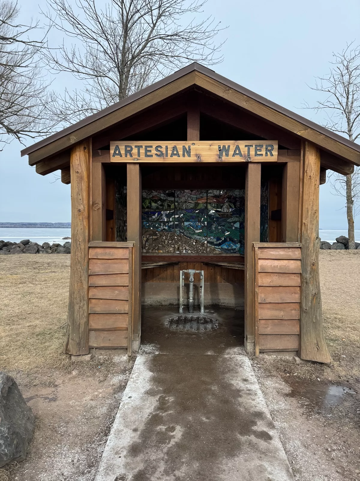 Artesian Well featuring mosaic wall art at Maslowski Beach in Ashland, WI